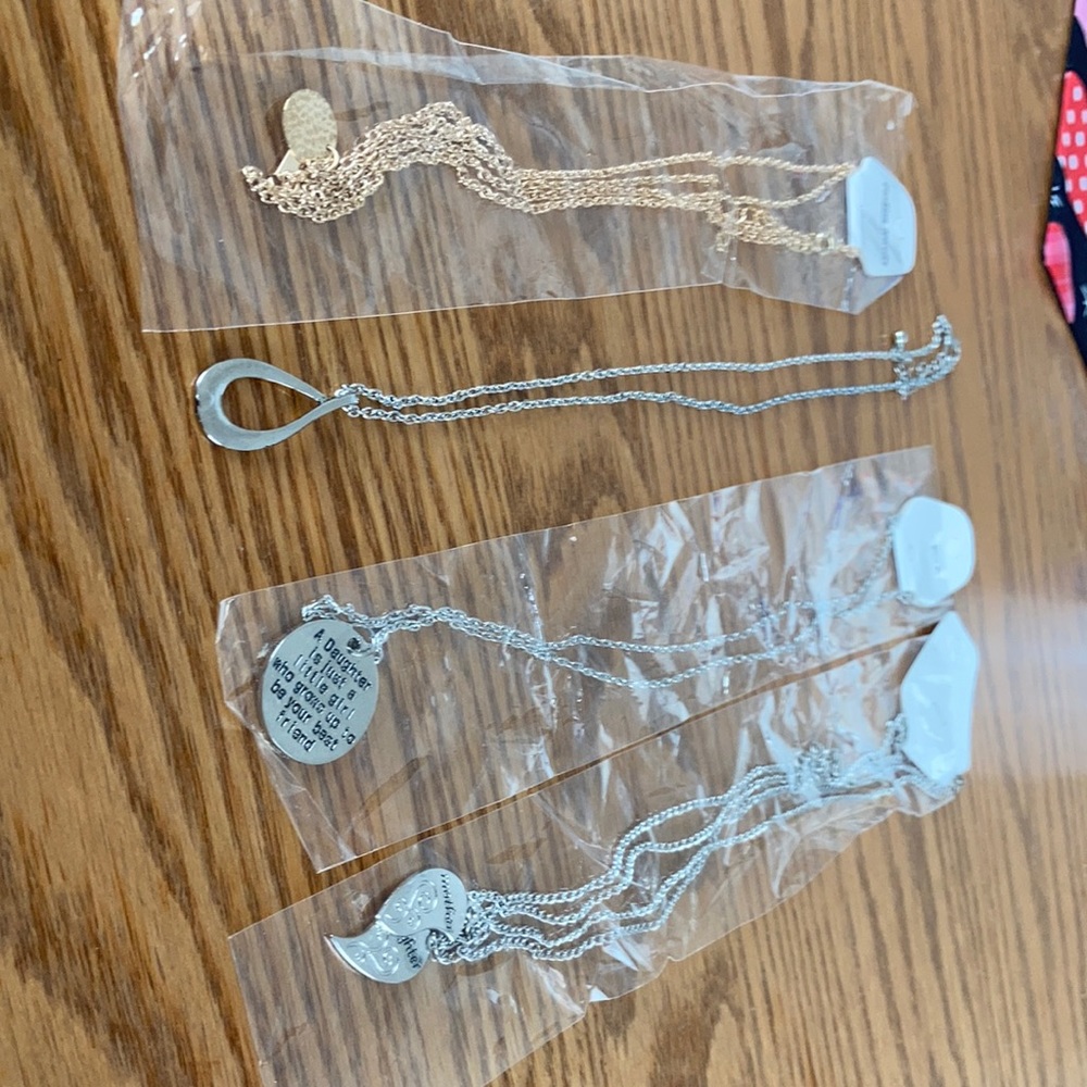 Set of 4 NWT Necklaces.